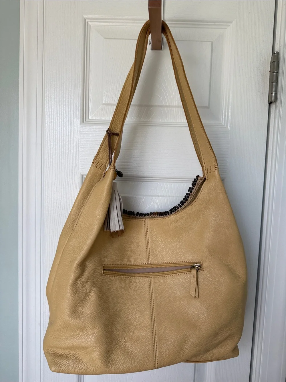The Sak Warm Yellow Leather Hobo with Tassel Accent